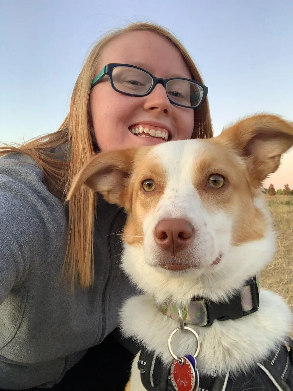 Rose pictured outside with a happy dog